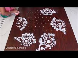 Easy And Simple Peacock Rangoli Design With 11 6 Dots Ii Flower Kolam Designs Ii Peac Free Hand Rangoli Design Rangoli Designs Flower Rangoli Designs With Dots