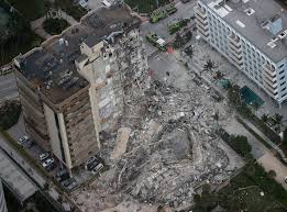 — a beachfront condo building partially collapsed thursday outside miami, killing at least one person and trapping others in the tower that resembled a giant fractured dollhouse. 85bqjyehueia M