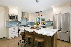 This Kitchen Has A Beautiful White Cabinets Pastel Backsplashe And Rustic Island A Perfect Design Kitchen Remodel Inspiration Modern Kitchen Kitchen Remodel