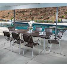 Musa 9 Piece Commercial Expandable Dining Set By Nardi Patio Patio Dining Set Outdoor Furniture Sets
