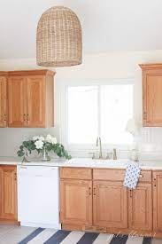 If you don't want to do it yourself, and are in the dayton/cincinnati area. Updating A Kitchen With Oak Cabinets Without Painting Them