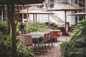 Talsma furniture in hudsonville, mi has earned a reputation for providing quality furniture for less since 1948. Tables And Chairs Of An Outdoor Coffee Shop Photograph By Visual Motiv