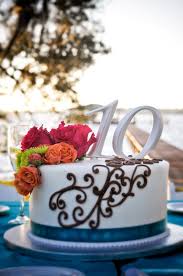 10th Anniversary Cake With Scroll Design Teal Ribbon And Flowers Jacksonville Fl Weddings First Coast Weddings Anniversary Cake Cake 10th Anniversary Idea