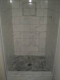 Tile is often the most used material in the bathroom, so choosing the right one is an easy way to kick up your bathroom's style. Faux Marble Custom Tile Bathroom Floor And Shower Redding Ca Quality Custom Tile Contractor Ec Tile