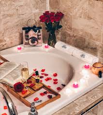 Old fashioned bathtub filled with water and bubbles. Romantic Bath Idea Rose Petals And Candles Romantic Spa Flower Bath Fancy Bathroom