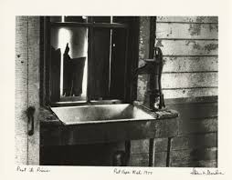 farmhouse sink and hand water pump