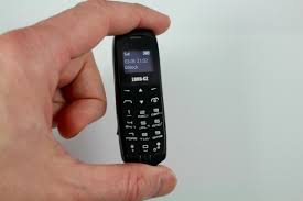 Take off the earring back and insert the post into the sim tray hole. Tearing Down The Boss Phone Hackaday