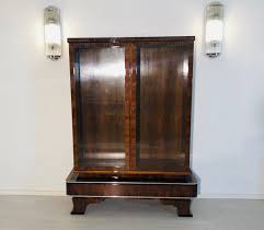 We stock original and reproduction pieces of furniture in the art deco style. 1930s Art Deco Walnut Vitrine Cabinet Original Antique Furniture