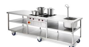 Stainless Steel Bakers Table Complete With Sink And Inbuilt Induction Hobs Bakers Table Kitchen Work Tables Restaurant Kitchen