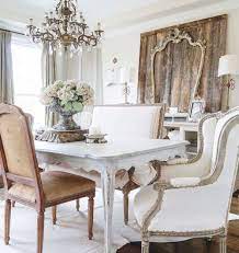 To mimic the rustic look of french country decor in a more modern way, opt for a jute rug in the living room. French Country Dining Room Via Romantic Homes A Silver Vintage Style Dining Table French Country Dining Room Country Dining Rooms French Country Living Room