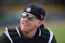 From pre-dawn work to squatting in the sun, nothing's normal about a spring  training day for an Orioles catcher