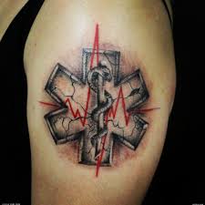 Tattooing a cross very boldly displays the bearer's faith and serves as a reminder of the story of christ's crucifixion. 3d Style Designed Medical Cross Symbol Tattoo On Shoulder Stylized With Snake And Heart Rhythm Tattooimages Biz