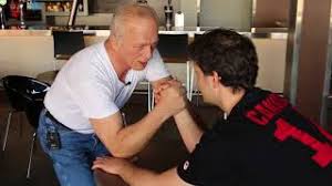 Standing with your dominant foot facing your opponent will help you leverage some of your body and torso weight into your arm. How To Win At Arm Wrestling Youtube