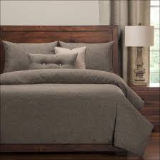 The bohemian farmhouse bedroom exemplifies country appeal with a jenny lind bed and playful horse accents. Stone Gray Farmhouse 6pc Bedding Set Nova