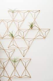 12 Diys To Get Air Plants On Your Wall Living Room Reveal Geometric Decor Geometric Wall Art