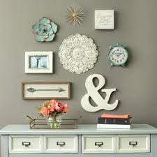 An oversized painting or photograph will command attention and set the tone in a small space. Small White Medallion Wall Decor Medallion Wall Decor Small Decor Decor