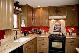 tuscan kitchen decor above cabinets