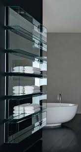 Sage design if you don't have quite enough space to handle shelves that jut out of the wall, consider recessed shelving, as in this modern bathroom by sage design. Bathroom Shelving Glass Shy Light Cubo Ri Fra Mobili Sleek Bathroom Modern Chic Bathroom Glass Bathroom