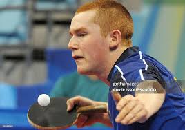 Kyle Davis of Australia serves to Ahmed Ali Saleh of Egypt during... News  Photo