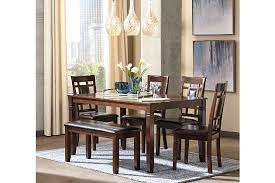 Bennox dining room table and chairs with bench (set of 6), , large. Bennox Dining Table And Chairs With Bench Set Of 6 Ashley Furniture Homestore