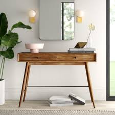 A geometric silhouette is enhanced by three triangular sections of the base, forming a w for added dimension in this contemporary console table. Wayfair Modern Contemporary Console Tables You Ll Love In 2021