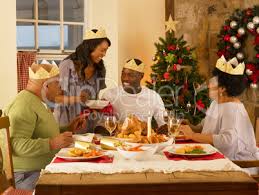 A page for describing usefulnotes: Adult African American Family Having Christmas Dinner Royalty Free Images Photos And Pictures