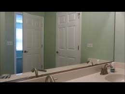 However, you'd probably need a whole team to manipulate it because it is heavy and doesn't give easily. Framing A Bathroom Mirror Youtube