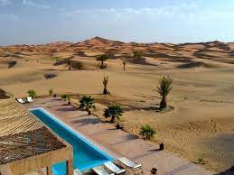 Dans notre parking de camping car de 25. Swimming Pool Services Of Hotel Kanz Erremal Hotel Desert Marzouga Marocc Merzouga