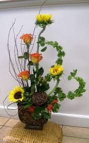 We did not find results for: Fall Arrangement Very Clever Use Of The Bells Of Ireland Which Curl Up This Wa Flower Arrangements Diy Basket Flower Arrangements Flower Arrangements Simple