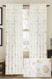 White linen drapes with red floral pattern. Muriel Kay Chantilly Linen Cotton Drapery Panel