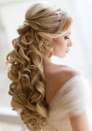 Use a shimmering clasp in the middle and curl the tips lightly. Bridal Hairstyles Half Up Half Down With Veil And Tiara Hair Styles Wedding Hair Down Long Hair Styles
