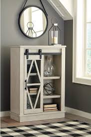 Vasagle free standing linen tower, bathroom storage cabinet, bookcase with 3 open shelves, 1 drawer and 1 cupboard, 23.6 x 12.8 x 60.6 inches, for entryway, kitchen, study room, white ubbc67wt. Ashley Furniture Home Store Launches Elegant Accent Cabinets Storage Units Architectandinteriorsindia