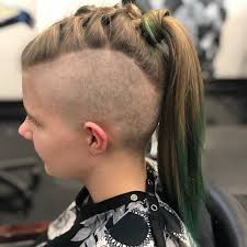The mohawk is a hairstyle in which, in the most common variety, both sides of the head are shaven, leaving a strip of noticeably longer hair in the center. 10 Offbeat Mohawk Hairstyles With Shaved Sides For Women Wetellyouhow