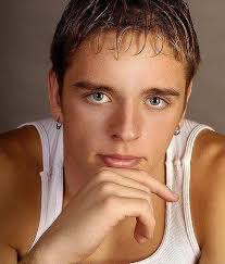 Male model. Inspiration for Tristan's ear piercings.