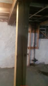 If you're removing and resetting more than one basement post, use one hydraulic jack and move from station to station as you install and later remove the shoring posts. Cracks Splits In Wood Beams Logs Vigas Posts Faqs Cause Effect Repair Of Checking Splits In Wood Beams Logs Vigas