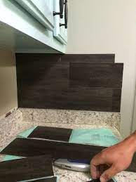 Our 40 Backsplash Using Vinyl Flooring Re Fabbed Diy Backsplash Home Remodeling Vinyl Flooring