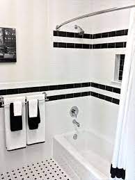 Even though the room is mostly white, the black and grey veins in the marble give the space depth. Small Bathroom Black And White Tile Bathroom Novocom Top