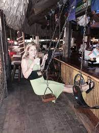Swing Seats At Mojo S Bar In St Thomas Sittingisthenewsmoking Swing Seat Backyard Bar Outdoor Kitchen Design