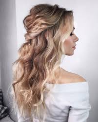 The hair on the left side should be curled towards the left to make curls face outward from the face and vice versa for the right sight. Wedding Guest Hairstyles 42 The Most Beautiful Ideas