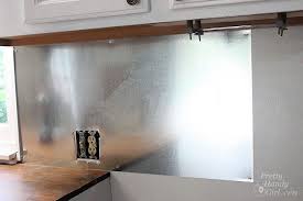 Install Your Own Magnetic Metallic Backsplash A Lowescreator Idea Metallic Backsplash Metal Backsplash Kitchen Sheet Metal Backsplash