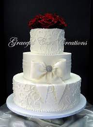 Elegant White Butter Cream Wedding Cake With Fondant Sash And Bow Cream Wedding Cakes Fondant Wedding Cakes Simple Wedding Cake