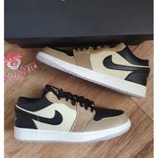Jordan signed with the company, and in 1985 the first shoe dropped: Jordan 1 Low Beige Black Brown Shopee Philippines