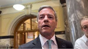 Malcolm puts surf lifesaving skills to good use