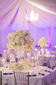 An Elegant Purple And White Wedding Every Last Detail Wedding Centerpieces Purple White Wedding Wedding Decorations