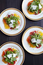 If you like christmas dinner starters, you might love these ideas. Citrus Salad With Arugula Ricotta Salata Citrus Salad Dinner Party Recipes Citrus Recipes