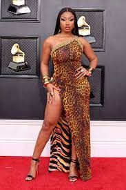 Megan Thee Stallion walked the Grammys red carpet in a bold leopard-print  dress with a thigh-high slit | Business Insider India