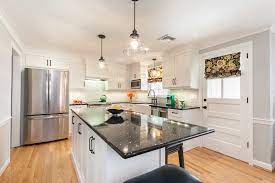 Modern design modular mdf white lacquer shaker kitchen cabinet with black marquina counter top. After Shaker Cabinetry And Flat Black Hardware Traditional Kitchen Bridgeport By Kitchen Bath Design Construction Houzz