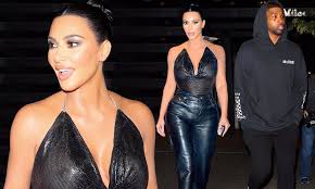 It looks like she is. Kim Kardashian Reveals All In Sheer Black Top And Almost Runs Into Khloe S Ex Tristan Thompson Daily Mail Online