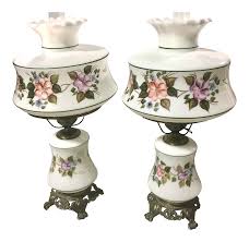 Clear glass hurricane lamp candle holders on aluminum round pedestal bases with contoured aluminum stems. Mid Century Hurricane Lamps A Pair Chairish