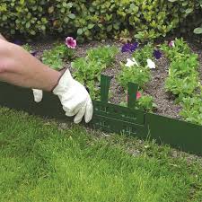 It helps separate the yard from the garden. Col Met 4 Ft Black Powder Coat Steel Landscape Edging Section Lowes Com Steel Edging Landscape Landscape Edging Green Powder